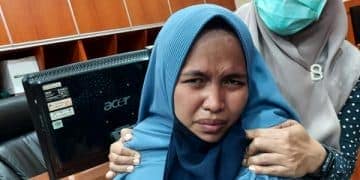 suami wanita membawa pistol tersangka