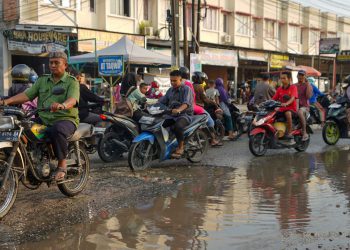 penyebab jalan rusak