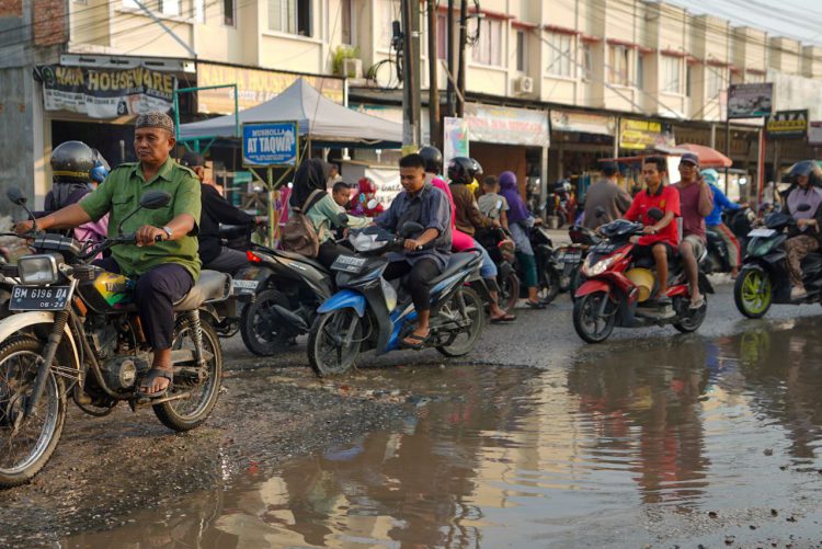 penyebab jalan rusak