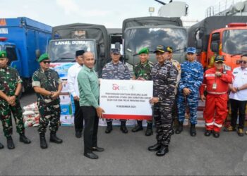 BRK Syariah dan OJK Riau Salurkan Bantuan Logistik untuk Korban Banjir Aceh Tamiang