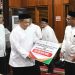 Safari Ramadan di Rohul, Plt Gubri Serahkan Bantuan CSR BRK Syariah