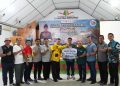 Penyerahan dukungan secara simbolis oleh SHR Manager RAPP Raja Elwan Jumanri kepada Pemerintah Kabupaten Kuansing yang diwakili oleh kepada Pj Sekretaris Daerah (Sekda) Kuansing Drs. Muradi, M.Si.